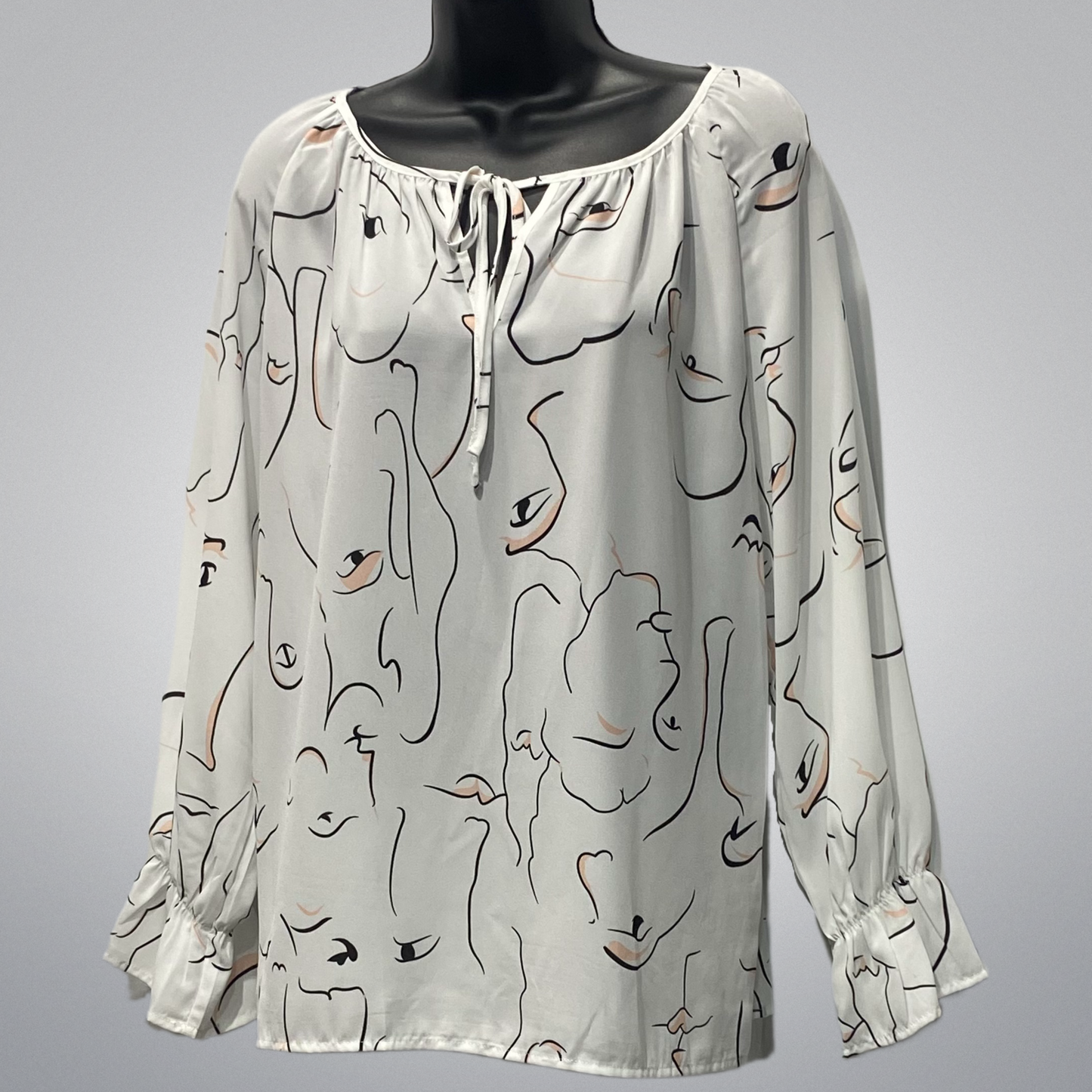 Tunic Top With Abstract Faces