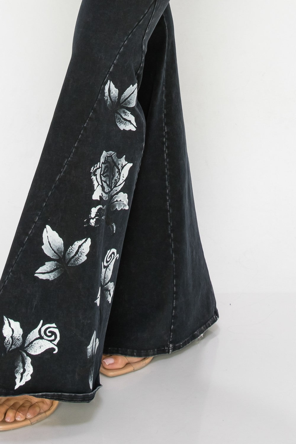 Black Pants with Printed White Rose Design