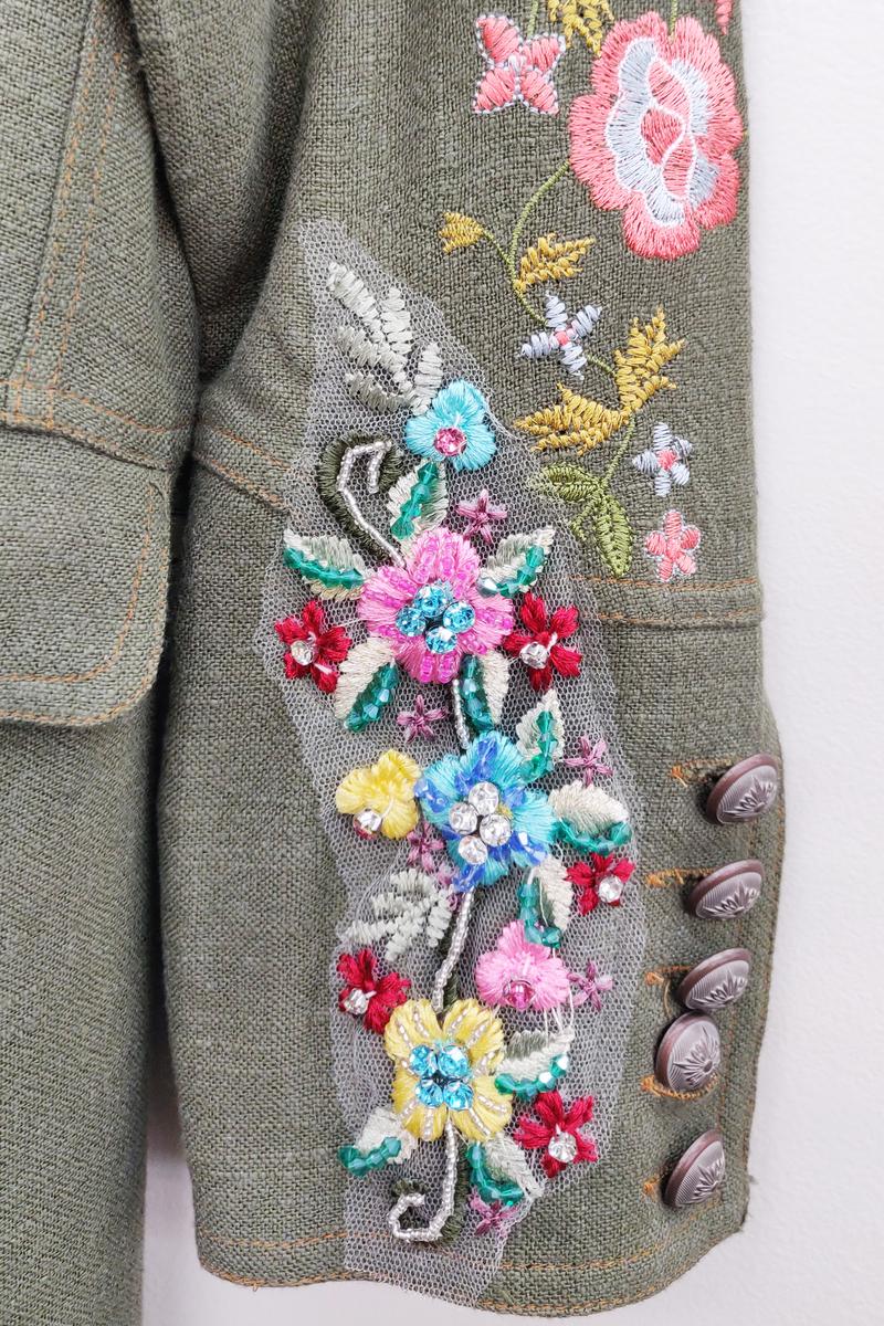 Long green coat with embelished sleeves