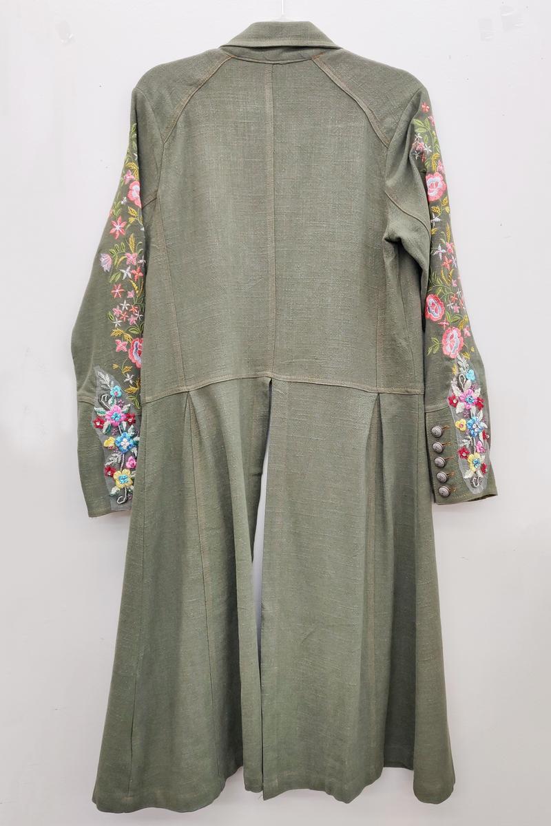 Long green coat with embelished sleeves