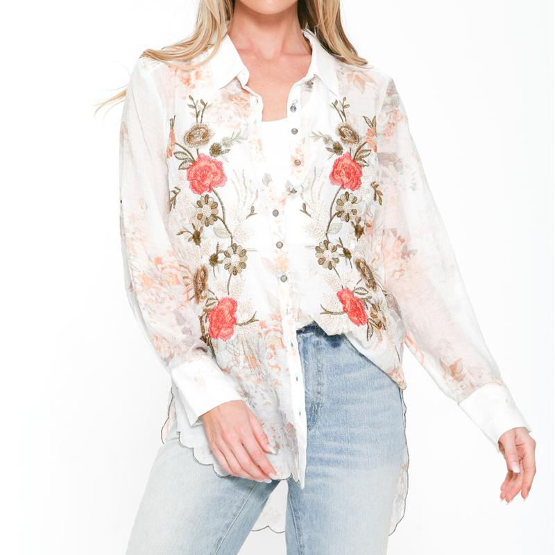 Unique apparel like this embroidered scallop cut blouse.