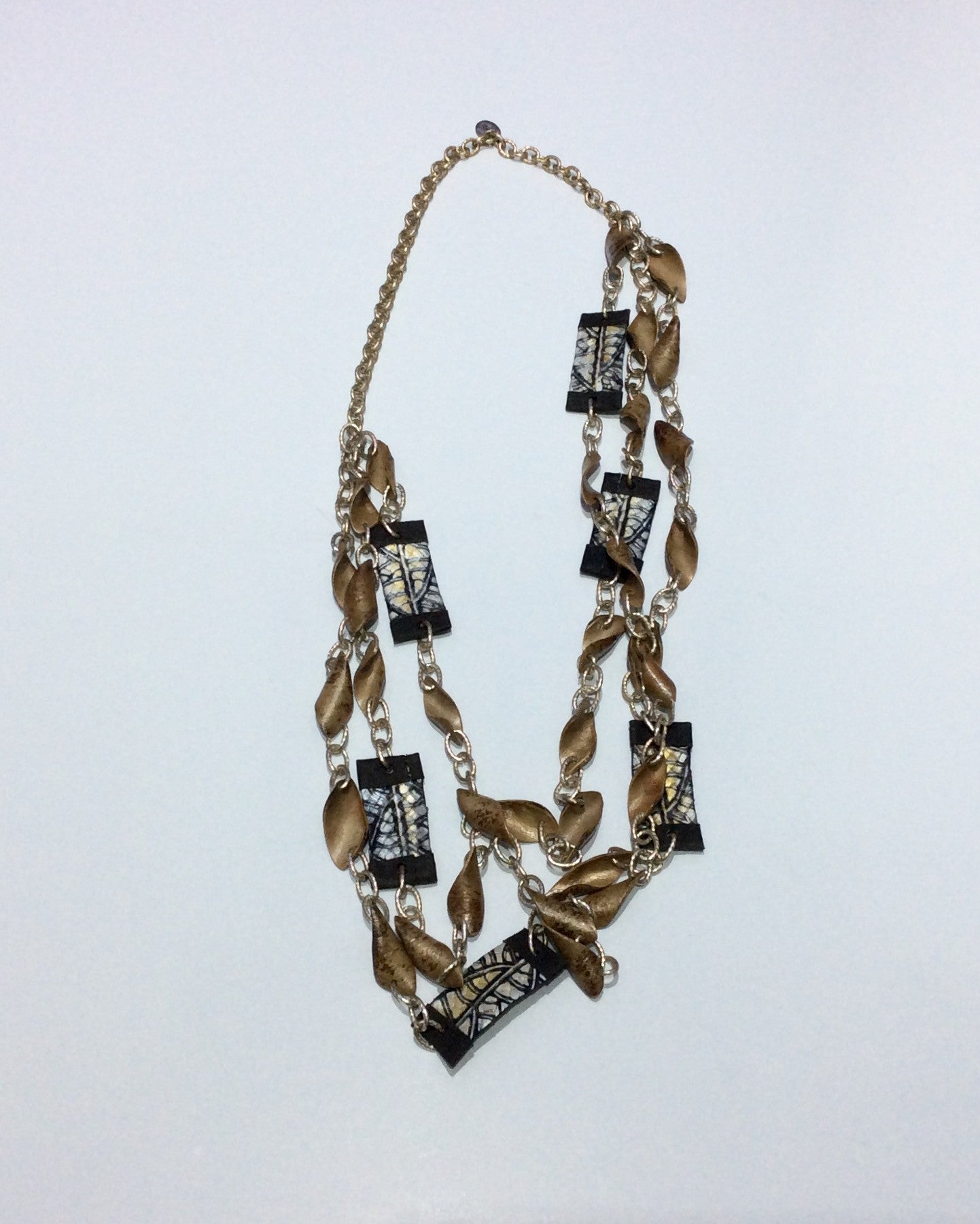 Necklace-Triple strand chain necklace withwood and Faux reptile leather beading