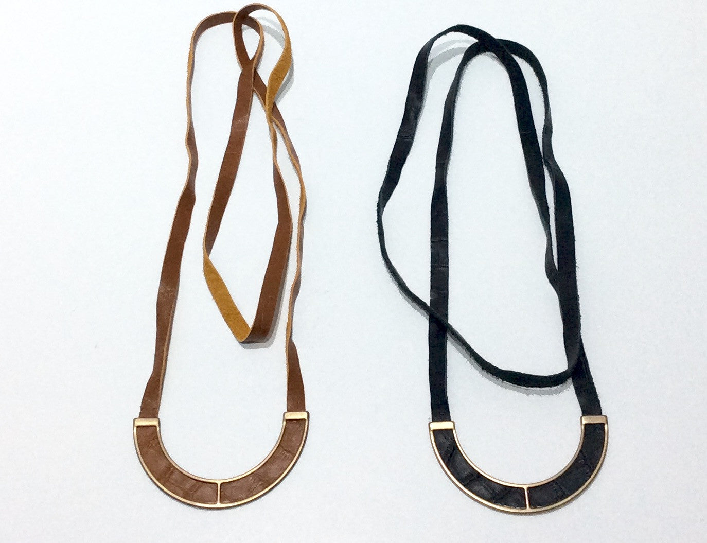 Necklace-Long suede cord with cord woven through stirrup design